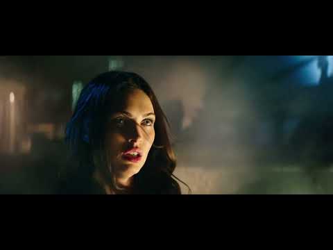 Trailer shot: the four turtles posed against the skyline as horns blaze