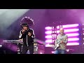 jamiroquai guitarist rob harris strap malfunction cosmic girl intro australia october 2023