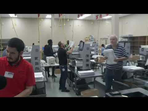 The recounting of Senate and gubernatorial ballots is underway in Florida's second most-populous county after it fixed problems with its machines. (Nov. 11)