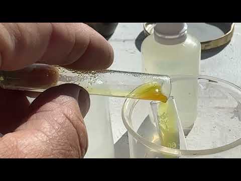 Testing rocks for gold using sodium nitrite.