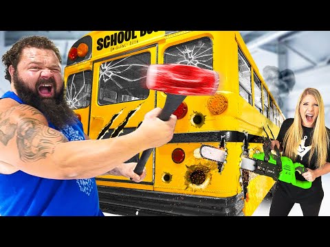Worlds STRONGEST MAN vs GIANT School Bus!