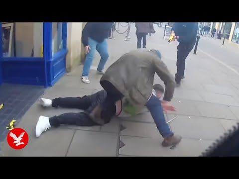 Gang of masked phone thieves burst into O2 store in violent high street raid