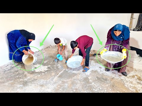 Family and common effort: finishing the white plaster of the wall and washing the house