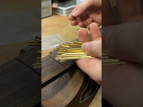 Refret with extra jumbo golden fretwire