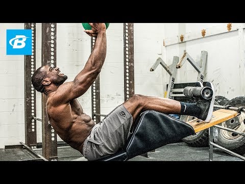 Weighted Incline Twisting Crunch (arms crossed)