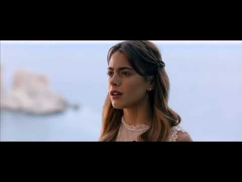 Trailer montage: airport crowds, seaside villa rehearsals, and a spotlighted stage for the finale