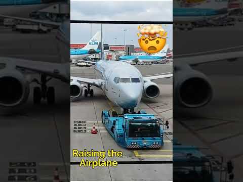 #Towing vehicle #Reversing the airplane at Schiphol airport, Amsterdam