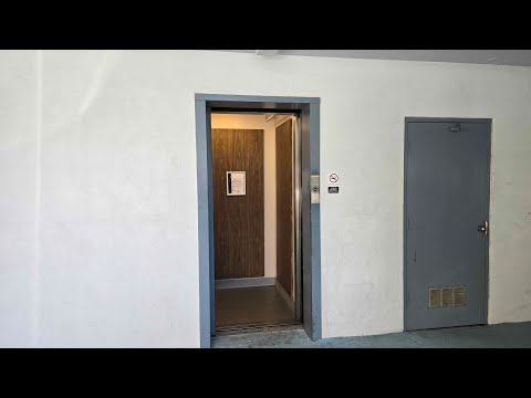 Honolulu, HI: Vintage OTIS Lexan Hydraulic Elevator in an Apartment Building