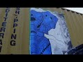 Painting Big Blue Elephant on shipping container