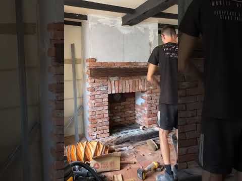 Chimney breast construction in Sunningdale with wood stove installation and reclaimed brick slips
