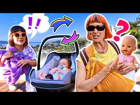 Bianca pretends to play mom for the baby born doll and have fun at the playground & in the mall.