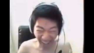 angry Korean gamer laughing at something and then rage