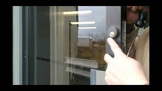 CHANGING THE LOCK ON A STOREFRONT DOOR