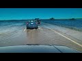 Flooded highway driving in Saskatchewan Canada - 1084457