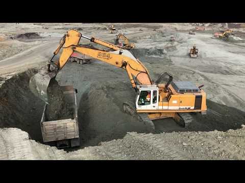 Liebherr 964 Excavator Loading Trucks