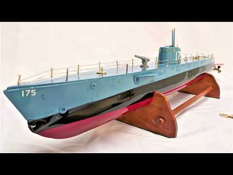 Westlake 25in windup tin toy submarine. of the USS TARPON WWII submarine.