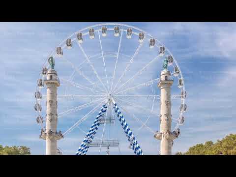 Ferris wheel at Place des Quinconces timelapse in Bordeaux, France.