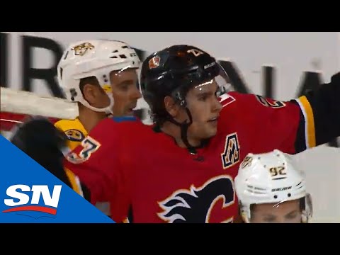 Sean Monahan Picks Up Loose Puck And Goes Backhand On Saros