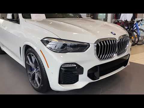 2020 BMW X5 40i Msport Package. Alpine white with Coffee Interior