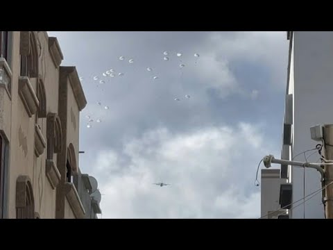 Planes parachute aid into Gaza City | AFP