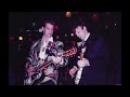 Chris Isaak and Silvertone performing "Fade Away" (audio from 1987)