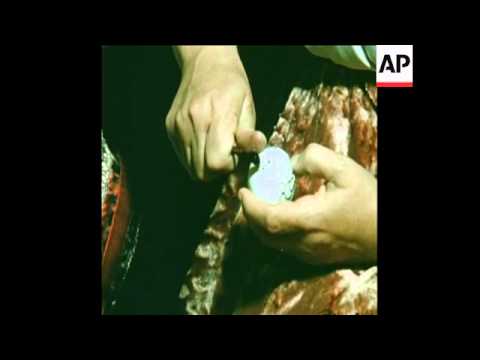 SYND 9 4 77 HUNGARIAN WOMEN PAINTING TRADITIONAL EASTER EGGS