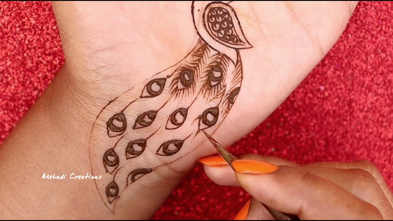  simple peacock henna mehndi design by mehndi creations