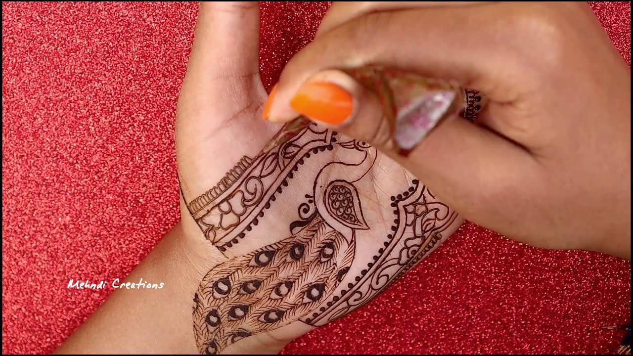  simple peacock henna mehndi design by mehndi creations