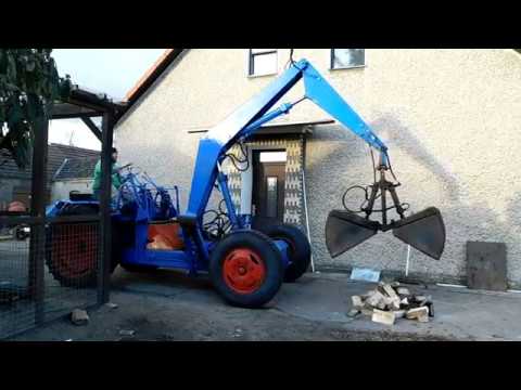 T 157/2 den Holzbunker befüllen Empor, Universallader, IFA