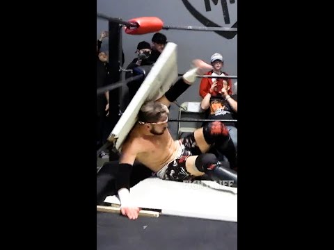 AKIRA put through a door by Gal Barkay Fight Life, AEW, WWE, NXT,