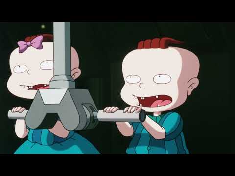 Trailer collage: Chuckie staring up at a princess display, the Reptar stage roaring to life, Spike sprinting past posters