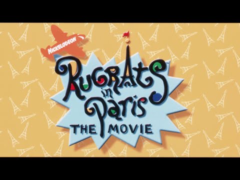 Trailer frame: Reptar stage show lighting hits, brass stabs and drumline accents cue the kids’ big adventure