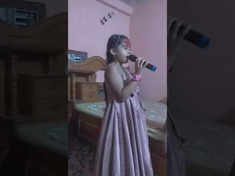 Little Nepali Girl singing Chinese Song.