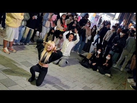 FRIDAY. RED CREW: LYYN. PRESENTING IMPROMPTU INTERACTIVE BUSKING WITH ONLOOKER. HONGDAE STREET.