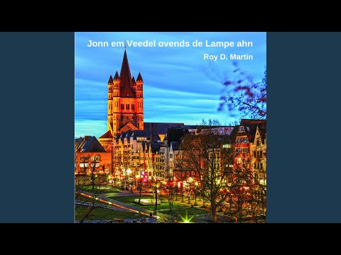 Jonn em Veedel ovends de Lampe ahn