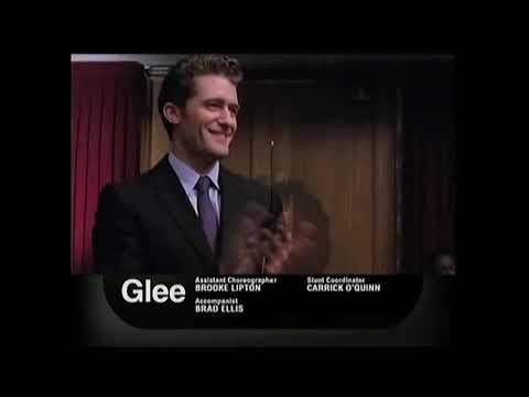 Promo frame: Blaine and brass flare swapped for black-and-gold New Directions blocking at Regionals