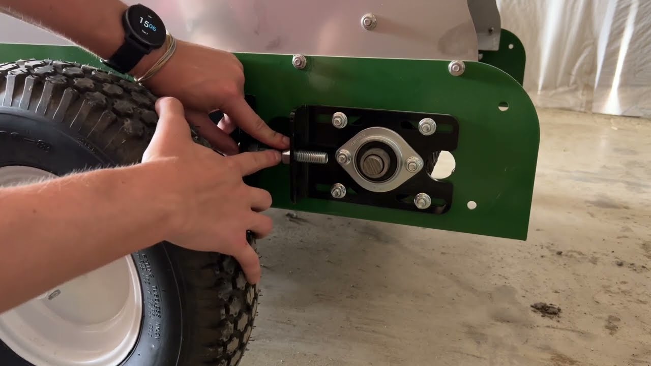 Straightening a Topdresser Materials Conveyor Belt; Earth & Turf 65PT
