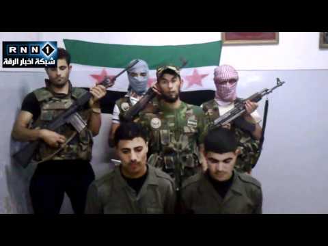 اسر جنديين عند دوار الساعة في مدينة الرقة من قبل كتيبة أويس القرني