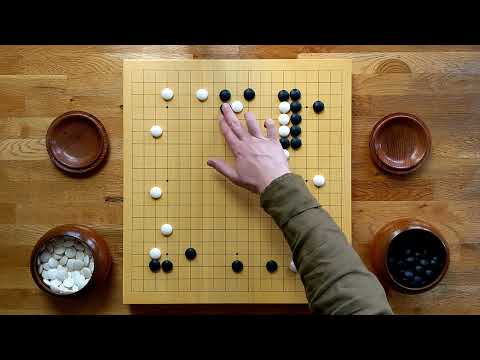Go Seigen (W) vs Kitani Minoru (B) Kamakura jubango - Game 1;  atmospheric game of Go, real board