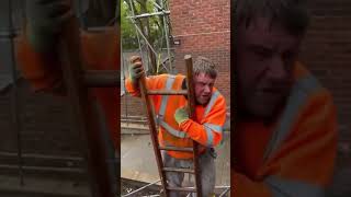 Guy stuck up ladder scared of heights