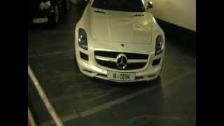 Supercars in Paris: white SLS AMG and black SLR