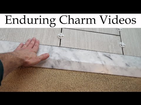 image-What do you put between hardwood and tile?