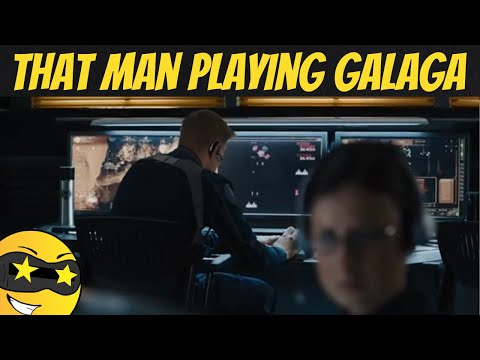 Did anyone notice that man was playing Galaga
