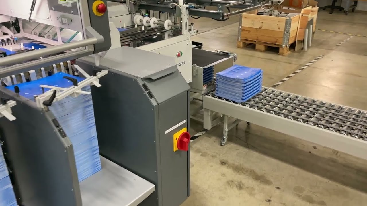 MKW Rapid Collator Machine running first In Store POP Collating Job