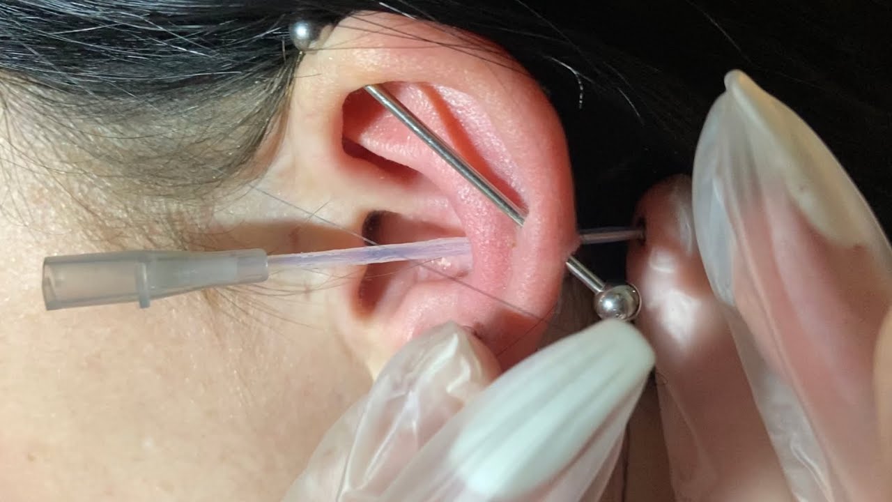 close up conch piercing at home