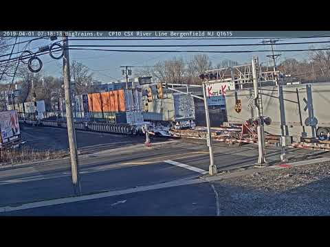 4- 1-2019 07:18 sb stack trailers CSX 3117, 5375 Q008