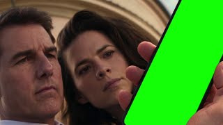 Ethan Hunt checks his phone Mission Impossible Dead Reckoning green screen
