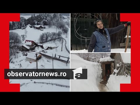 Zăpadă cât casa în Buzău: "Cu lopata, mamă, că elicopterul nu vine pe aici"