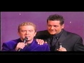 John Culshaw impersonates Dale Winton in front of.