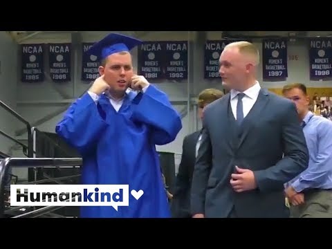 Auditorium goes silent so autistic student can accept diploma | Humankind
